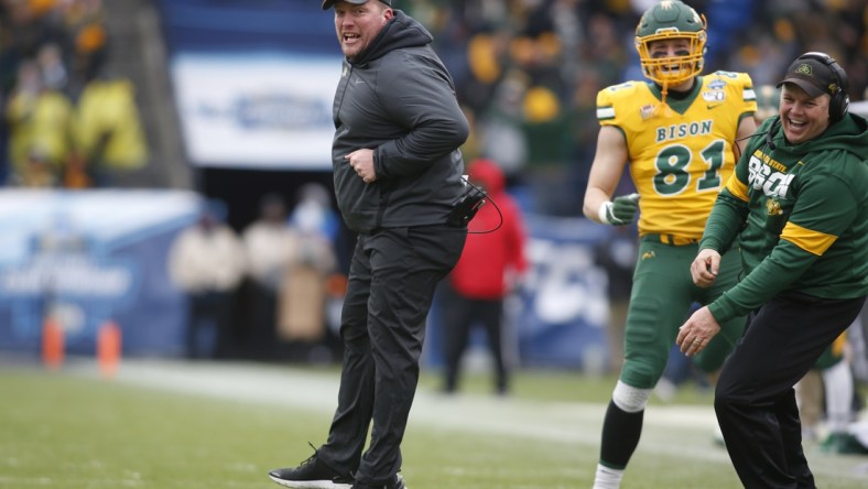 Jan 11, 2020; Frisco, Texas, USA; North Dakota State Bison head coach Matt Entz reacts to a touchdown on a fake field goal in the second quarter against the James Madison Dukes at Toyota Stadium. Mandatory Credit: Tim Heitman-USA TODAY Sports