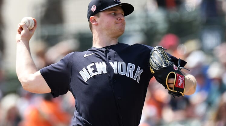Mar 8, 2020; Sarasota, Florida, USA; New York Yankees pitcher Clarke Schmidt (86) throws a pitch in the first inning of the game against the Baltimore Orioles at Ed Smith Stadium. Mandatory Credit: Jonathan Dyer-USA TODAY Sports