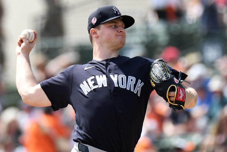 Mar 8, 2020; Sarasota, Florida, USA; New York Yankees pitcher Clarke Schmidt (86) throws a pitch in the first inning of the game against the Baltimore Orioles at Ed Smith Stadium. Mandatory Credit: Jonathan Dyer-USA TODAY Sports