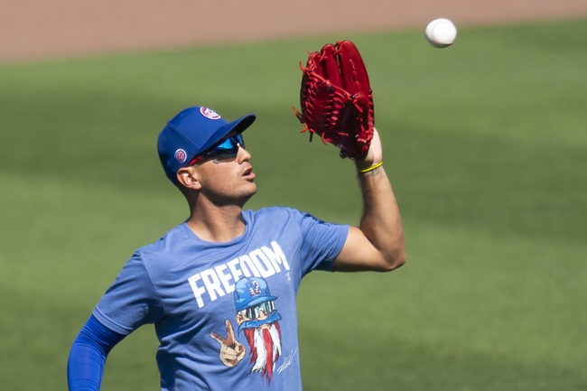 Jul 5, 2020; Chicago, Illinois, United States; Chicago Cubs center fielder Albert Almora Jr. (5) catches a ball prior to a sim game at Wrigley Field. Mandatory Credit: Patrick Gorski-USA TODAY Sports