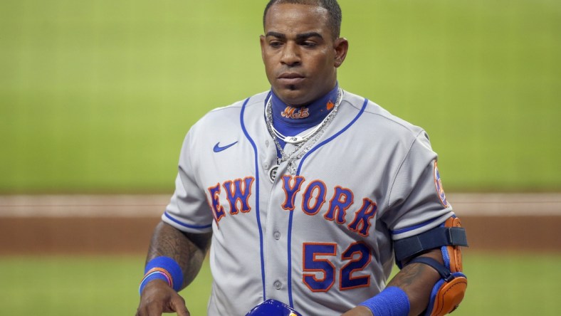 Aug 1, 2020; Atlanta, Georgia, USA; New York Mets left fielder Yoenis Cespedes (52) walks to the dugout after an at bat against the Atlanta Braves in the fifth inning at Truist Park. Mandatory Credit: Brett Davis-USA TODAY Sports