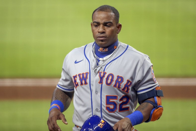 Aug 1, 2020; Atlanta, Georgia, USA; New York Mets left fielder Yoenis Cespedes (52) walks to the dugout after an at bat against the Atlanta Braves in the fifth inning at Truist Park. Mandatory Credit: Brett Davis-USA TODAY Sports