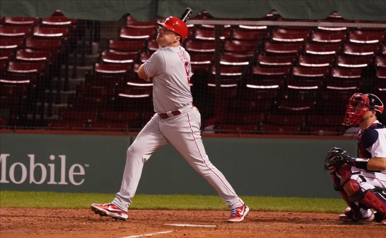 Aug 18, 2020; Boston, Massachusetts, USA; Philadelphia Phillies left fielder Jay Bruce (9) hits a three run home run against the Boston Red Sox in the eighth inning at Fenway Park. Mandatory Credit: David Butler II-USA TODAY Sports
