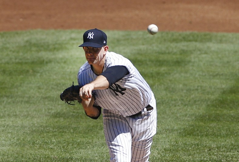 Aug 20, 2020; Bronx, New York, USA; New York Yankees starting pitcher James Paxton (65) pitches against the Tampa Bay Rays during the second inning at Yankee Stadium. Mandatory Credit: Andy Marlin-USA TODAY Sports