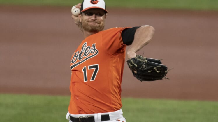 Aug 22, 2020; Baltimore, Maryland, USA;  Baltimore Orioles starting pitcher Alex Cobb (17) delivers a pitch during the first inning against the Boston Red Sox at Oriole Park at Camden Yards. Mandatory Credit: Tommy Gilligan-USA TODAY Sports