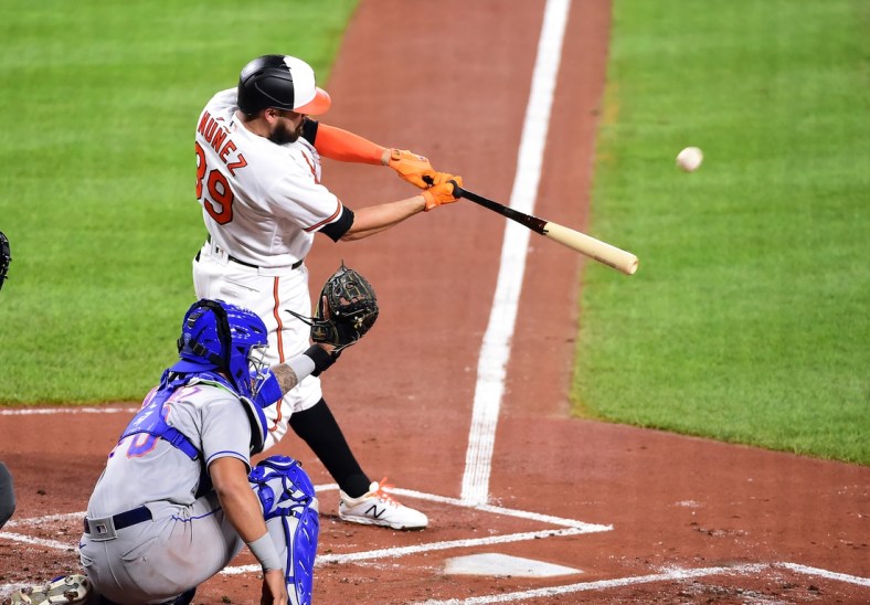 Sep 1, 2020; Baltimore, Maryland, USA; Baltimore Orioles first baseman Renato Nunez (39) hits a home run in the first inning against the New York Mets at Oriole Park at Camden Yards. Mandatory Credit: Evan Habeeb-USA TODAY Sports