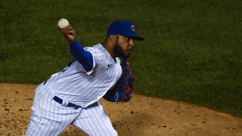 Sep 8, 2020; Chicago, Illinois, USA;  Chicago Cubs relief pitcher Jeremy Jeffress (24) delivers in the ninth inning against the Cincinnati Reds at Wrigley Field. Mandatory Credit: Matt Marton-USA TODAY Sports