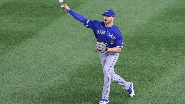 Sep 15, 2020; Bronx, New York, USA; Toronto Blue Jays center fielder Derek Fisher (23) throws the ball during the second inning against the New York Yankees at Yankee Stadium. Mandatory Credit: Vincent Carchietta-USA TODAY Sports