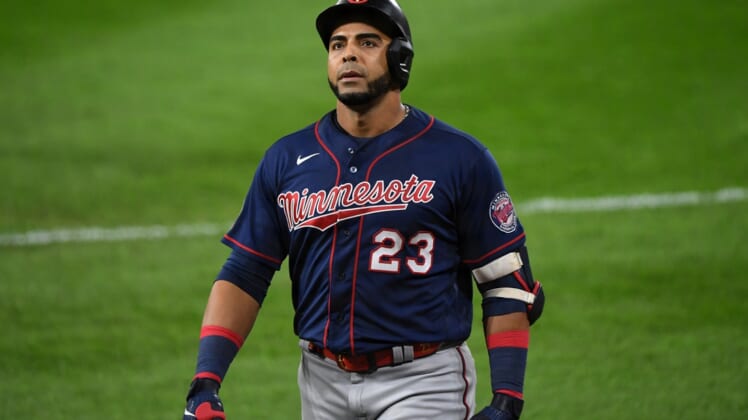 Sep 16, 2020; Chicago, Illinois, USA; Minnesota Twins designated hitter Nelson Cruz (23) reacts after an out against the Chicago White Sox during the third inning at Guaranteed Rate Field. Mandatory Credit: Mike Dinovo-USA TODAY Sports
