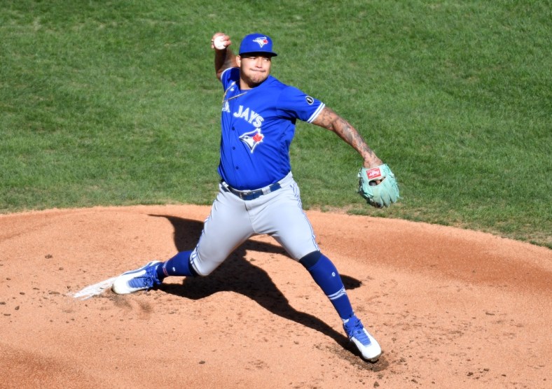 Sep 20, 2020; Philadelphia, Pennsylvania, USA; Toronto Blue Jays starting pitcher Taijuan Walker (00) throws a pitch during the first inning against the Philadelphia Phillies at Citizens Bank Park. Mandatory Credit: Eric Hartline-USA TODAY Sports