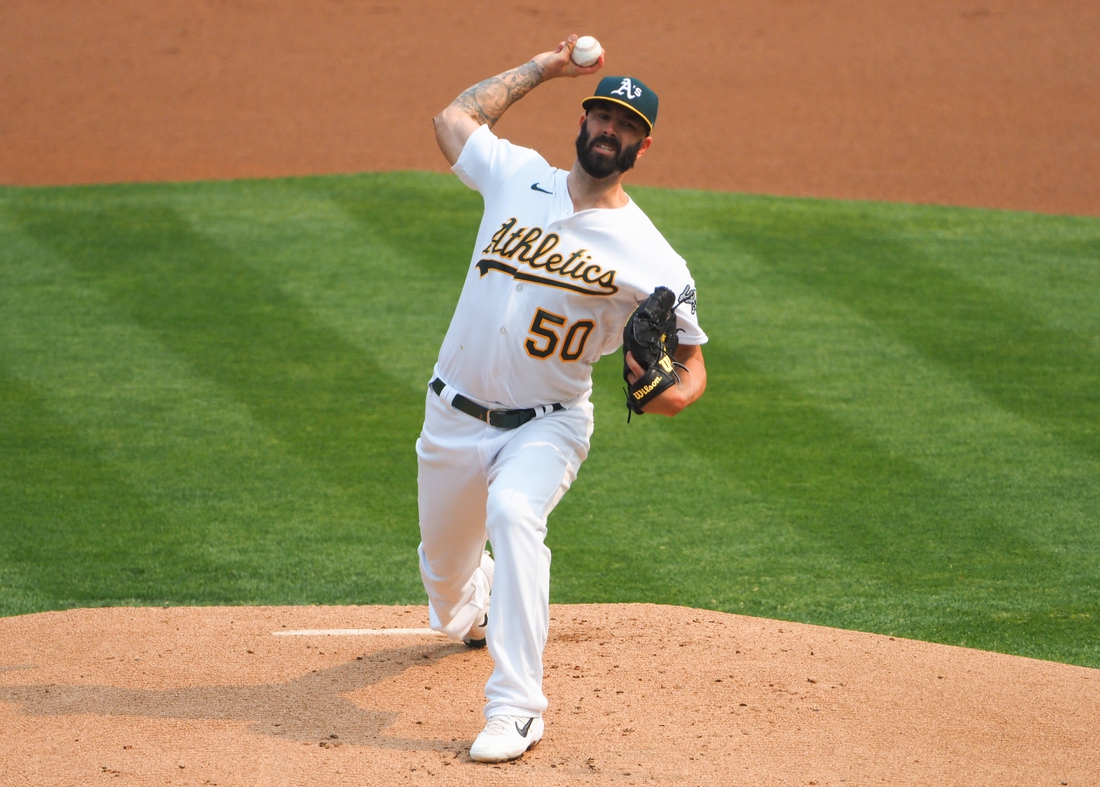 Oct 1, 2020; Oakland, California, USA; Oakland Athletics starting pitcher Mike Fiers (50) pitches the ball against the Chicago White Sox during the first inning at Oakland Coliseum. Mandatory Credit: Kelley L Cox-USA TODAY Sports