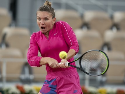 Oct 4, 2020; Paris, France; Simona Halep (ROU) in action during her match against Iga Swiatek (POL) on day eight at Stade Roland Garros. Mandatory Credit: Susan Mullane-USA TODAY Sports