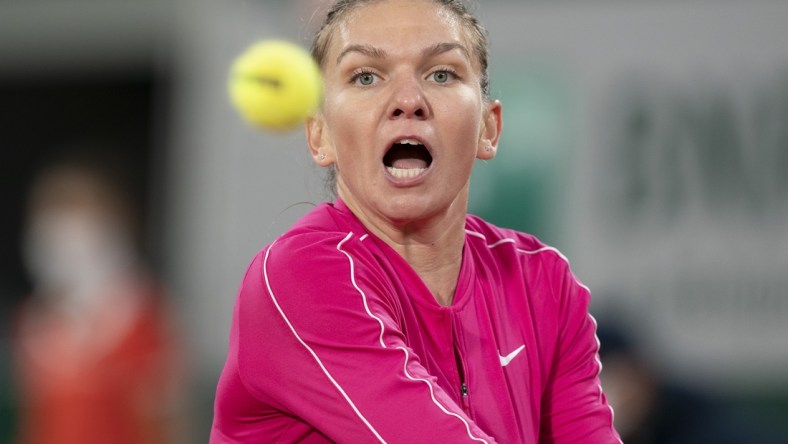 Oct 4, 2020; Paris, France; Simona Halep (ROU) in action during her match against Iga Swiatek (POL) on day eight at Stade Roland Garros. Mandatory Credit: Susan Mullane-USA TODAY Sports