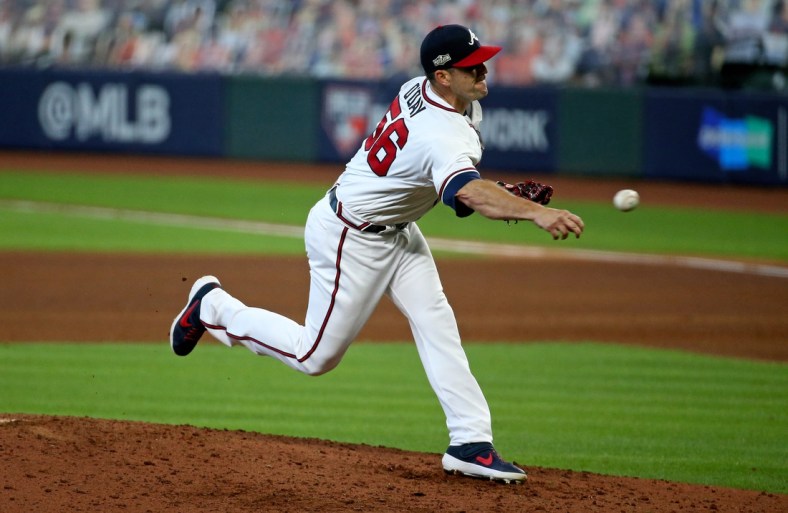 Oct 6, 2020; Houston, Texas, USA; Atlanta Braves relief pitcher Darren O'Day (56) delivers a pitch in the 5th inning against the Miami Marlins during game one of the 2020 NLDS at Minute Maid Park. Mandatory Credit: Troy Taormina-USA TODAY Sports