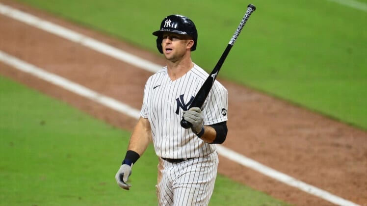Oct 7, 2020; San Diego, California, USA; New York Yankees left fielder Brett Gardner (11) reacts after striking out in the eighth inning against the Tampa Bay Rays during game three of the 2020 ALDS at Petco Park. Mandatory Credit: Gary A. Vasquez-USA TODAY Sports