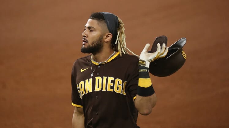 Oct 7, 2020; Arlington, Texas, USA; San Diego Padres shortstop Fernando Tatis Jr. (23) reacts after making an out during the fifth inning in game two of the 2020 NLDS against the Los Angeles Dodgers at Globe Life Field. Mandatory Credit: Kevin Jairaj-USA TODAY Sports