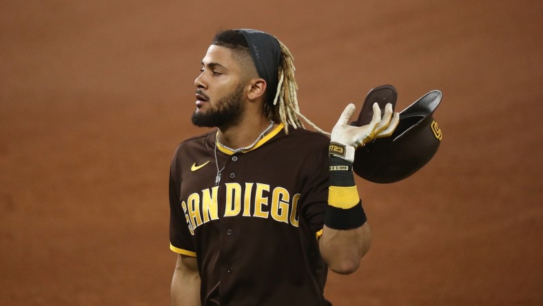 Oct 7, 2020; Arlington, Texas, USA; San Diego Padres shortstop Fernando Tatis Jr. (23) reacts after making an out during the fifth inning in game two of the 2020 NLDS against the Los Angeles Dodgers at Globe Life Field. Mandatory Credit: Kevin Jairaj-USA TODAY Sports