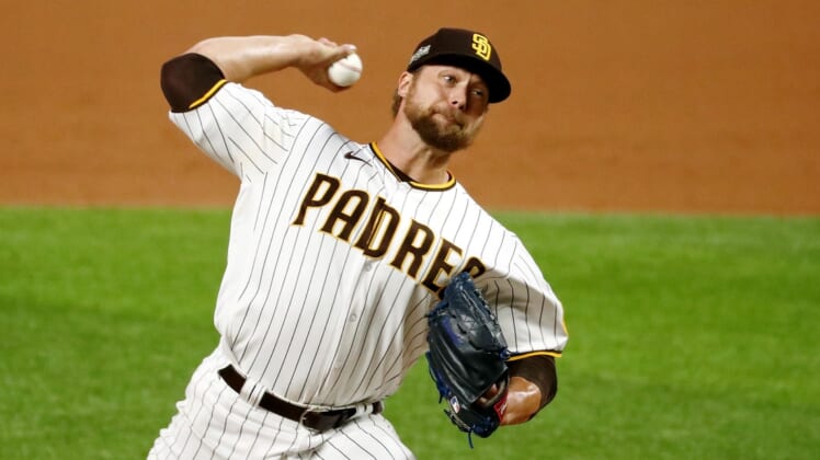 Oct 8, 2020; Arlington, Texas, USA; San Diego Padres relief pitcher Trevor Rosenthal (47), the eleventh pitcher for the team in the game, pitches against the Los Angeles Dodgers during the ninth inning during game three of the 2020 NLDS at Globe Life Field. Mandatory Credit: Kevin Jairaj-USA TODAY Sports