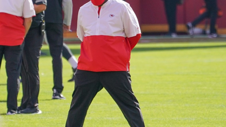 Oct 11, 2020; Kansas City, Missouri, USA; Kansas City Chiefs offensive coordinator Eric Bieniemy watches warm ups before the game against the Las Vegas Raiders at Arrowhead Stadium. Mandatory Credit: Denny Medley-USA TODAY Sports