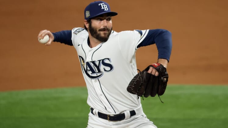 Oct 23, 2020; Arlington, Texas, USA; Tampa Bay Rays relief pitcher John Curtiss (84) throws against the Los Angeles Dodgers during the fifth inning of game three of the 2020 World Series at Globe Life Field. Mandatory Credit: Kevin Jairaj-USA TODAY Sports