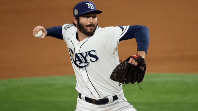 Oct 23, 2020; Arlington, Texas, USA; Tampa Bay Rays relief pitcher John Curtiss (84) throws against the Los Angeles Dodgers during the fifth inning of game three of the 2020 World Series at Globe Life Field. Mandatory Credit: Kevin Jairaj-USA TODAY Sports