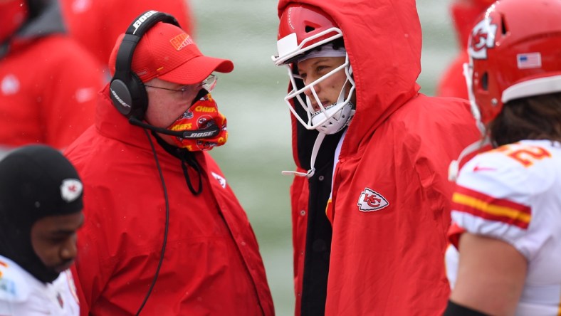 Oct 25, 2020; Denver, Colorado, USA; Kansas City Chiefs head coach Andy Reid speaks to quarterback Patrick Mahomes (15) in the first half against the Denver Broncos at Empower Field at Mile High. Mandatory Credit: Ron Chenoy-USA TODAY Sports