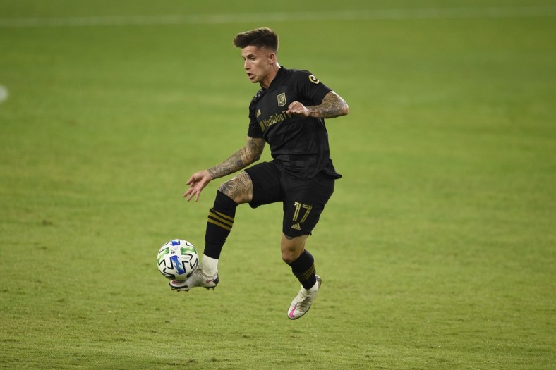 Oct 28, 2020; Los Angeles, CA, Los Angeles, CA, USA; Los Angeles FC forward Brian Rodriguez (17) handles the ball against the Houston Dynamo during the first half at Banc of California Stadium. Mandatory Credit: Kelvin Kuo-USA TODAY Sports