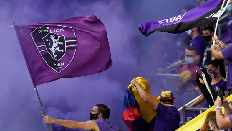 Nov 8, 2020; Orlando, Florida, USA; Orlando City fans get ready for the start of the match against Nashville SC at Orlando City Stadium. Mandatory Credit: Jonathan Dyer-USA TODAY Sports