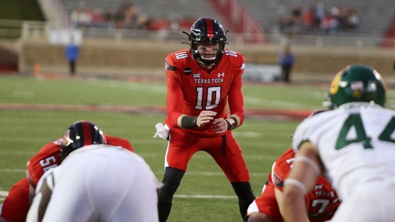 Nov 14, 2020; Lubbock, Texas, USA;  Texas Tech Red Raiders quarterback Alan Bowman (10) calls signals in the second half in the game against the Baylor Bears at Jones AT&T Stadium. Mandatory Credit: Michael C. Johnson-USA TODAY Sports