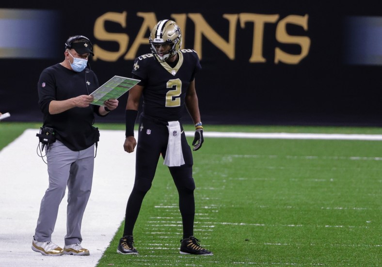 Nov 15, 2020; New Orleans, Louisiana, USA; New Orleans Saints head coach Sean Payton and quarterback Jameis Winston (2) talk on the sideline during the second half against the San Francisco 49ers at the Mercedes-Benz Superdome. Mandatory Credit: Derick E. Hingle-USA TODAY Sports