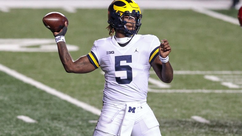 Nov 21, 2020; Piscataway, New Jersey, USA; Michigan Wolverines quarterback Joe Milton (5) throws the ball against the Rutgers Scarlet Knights during the first half at SHI Stadium. Mandatory Credit: Vincent Carchietta-USA TODAY Sports