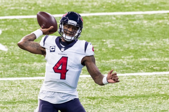 Dec 20, 2020; Indianapolis, Indiana, USA; Houston Texans quarterback Deshaun Watson (4) passes the ball against the Indianapolis Colts in the first half at Lucas Oil Stadium. Mandatory Credit: Trevor Ruszkowski-USA TODAY Sports