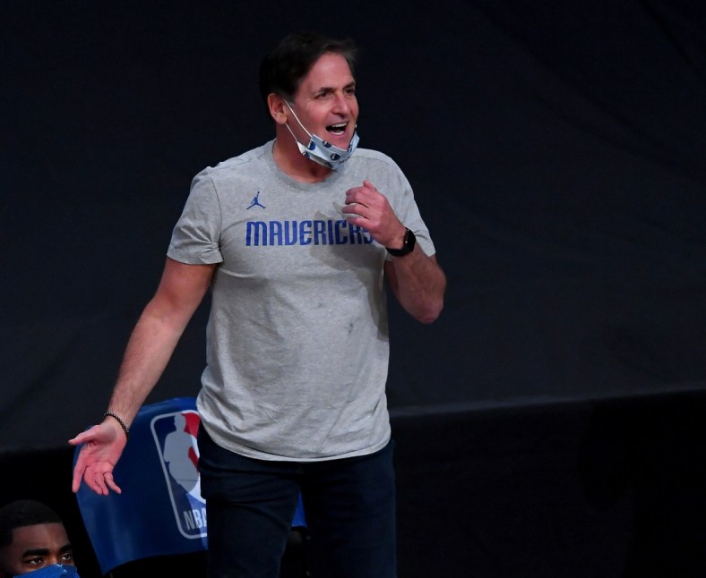 Dec 25, 2020; Los Angeles, California, USA;   Dallas Mavericks owner Mark Cuban looks on from the bench area during the game against the Los Angeles Lakers at Staples Center. Mandatory Credit: Jayne Kamin-Oncea-USA TODAY Sports
