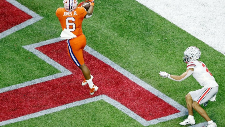 Jan 1, 2021; New Orleans, LA, USA; Clemson Tigers linebacker Mike Jones Jr. (6) intercepts a pass intended for Ohio State Buckeyes wide receiver Chris Olave (2) during the third quarter at Mercedes-Benz Superdome. Mandatory Credit: Russell Costanza-USA TODAY Sports