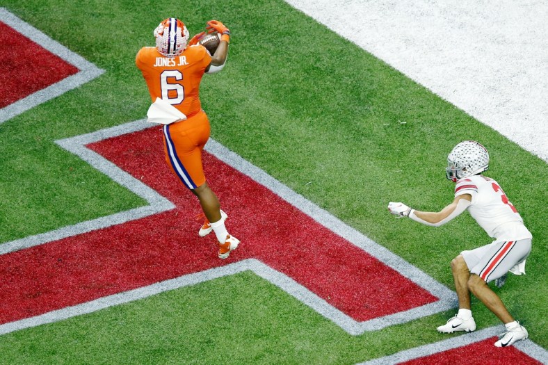 Jan 1, 2021; New Orleans, LA, USA; Clemson Tigers linebacker Mike Jones Jr. (6) intercepts a pass intended for Ohio State Buckeyes wide receiver Chris Olave (2) during the third quarter at Mercedes-Benz Superdome. Mandatory Credit: Russell Costanza-USA TODAY Sports