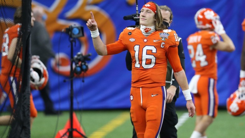 Jan 1, 2021; New Orleans, LA, USA; Clemson Tigers quarterback Trevor Lawrence (16) reacts after the game against the Ohio State Buckeyes at Mercedes-Benz Superdome. Mandatory Credit: Chuck Cook-USA TODAY Sports