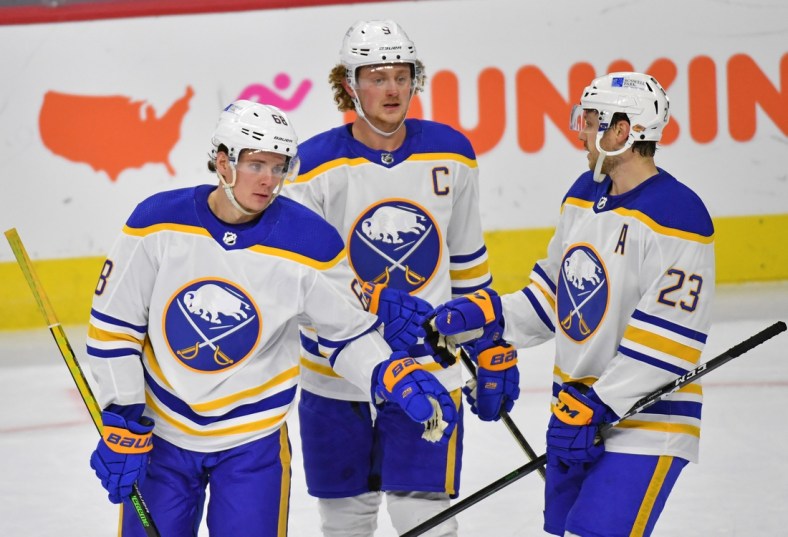 Jan 18, 2021; Philadelphia, Pennsylvania, USA; Buffalo Sabres right wing Victor Olofsson (68) celebrates his goal with center Jack Eichel (9) and center Sam Reinhart (23) against the Philadelphia Flyers during the third period at Wells Fargo Center. Mandatory Credit: Eric Hartline-USA TODAY Sports