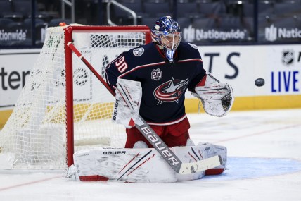 Jan 28, 2021; Columbus, Ohio, USA; Columbus Blue Jackets goaltender Elvis Merzlikins (90) makes a save in net against the Florida Panthers in the second period at Nationwide Arena. Mandatory Credit: Aaron Doster-USA TODAY Sports