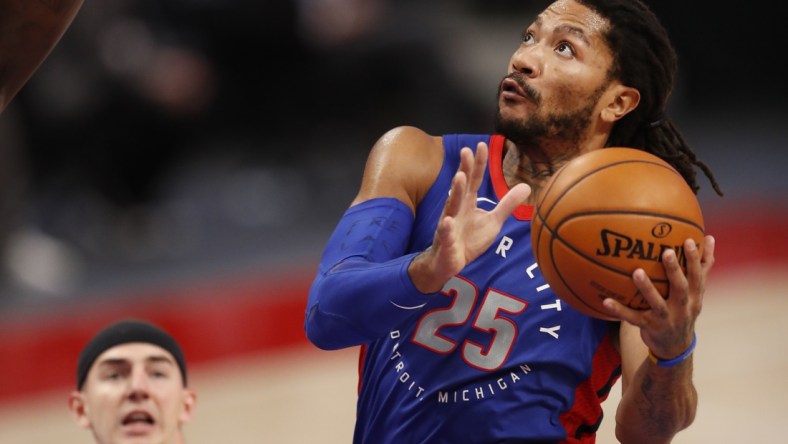 Jan 28, 2021; Detroit, Michigan, USA; Detroit Pistons guard Derrick Rose (25) goes up for a shot during the fourth quarter against the Los Angeles Lakers at Little Caesars Arena. Mandatory Credit: Raj Mehta-USA TODAY Sports