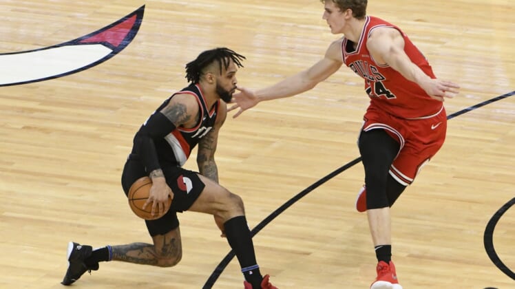 Jan 30, 2021; Chicago, Illinois, USA; Portland Trail Blazers guard Gary Trent Jr. (2) is defended by Chicago Bulls forward Lauri Markkanen (24) during the second half at United Center. Mandatory Credit: David Banks-USA TODAY Sports