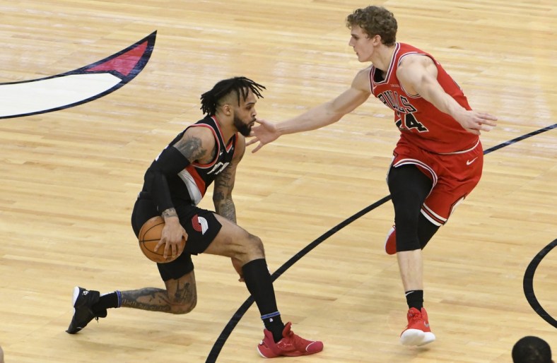 Jan 30, 2021; Chicago, Illinois, USA; Portland Trail Blazers guard Gary Trent Jr. (2) is defended by Chicago Bulls forward Lauri Markkanen (24) during the second half at United Center. Mandatory Credit: David Banks-USA TODAY Sports