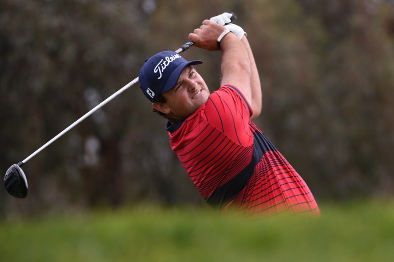 Jan 31, 2021; San Diego, California, USA; Patrick Reed plays his shot from the 12th tee during the final round of the Farmers Insurance Open golf tournament at Torrey Pines Municipal Golf Course - South Course. Mandatory Credit: Orlando Ramirez-USA TODAY Sports