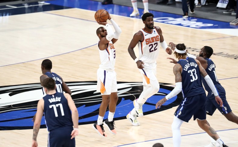 Feb 1, 2021; Dallas, Texas, USA; Phoenix Suns guard Chris Paul (3) shoots over during the first half against the Dallas Mavericks at American Airlines Center. Mandatory Credit: Kevin Jairaj-USA TODAY Sports