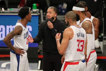 Feb 2, 2021; Brooklyn, New York, USA; Los Angeles Clippers head coach Tyronn Lue (black face mask) coaches his team during a time out in the third quarter against the Brooklyn Nets at Barclays Center. Mandatory Credit: Brad Penner-USA TODAY Sports