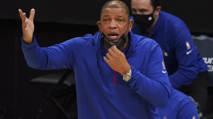 Feb 3, 2021; Charlotte, North Carolina, USA; Philadelphia 76ers Head Coach Doc Rivers reacts to a call during the second quarter against the Charlotte Hornets at Spectrum Center. Mandatory Credit: Jim Dedmon-USA TODAY Sports