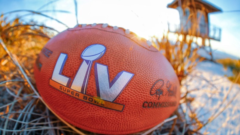 Feb 4, 2021; Tampa Bay, Florida, USA; A general view of the Super Bowl LV official football on the beach at Anna Maria Island.  Mandatory Credit: Kim Klement-USA TODAY Sports