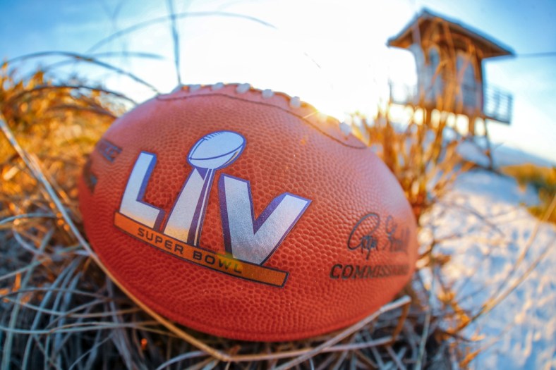 Feb 4, 2021; Tampa Bay, Florida, USA; A general view of the Super Bowl LV official football on the beach at Anna Maria Island.  Mandatory Credit: Kim Klement-USA TODAY Sports