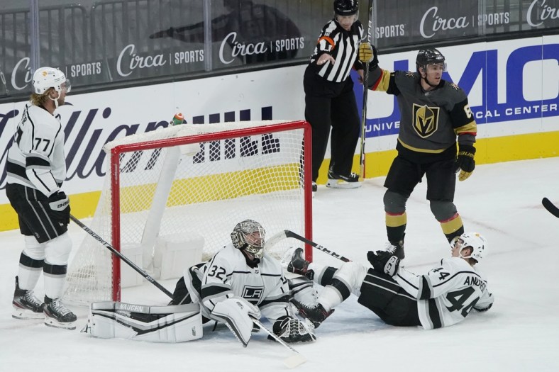 Feb 5, 2021; Las Vegas, Nevada, USA; Vegas Golden Knights center Jonathan Marchessault (81) celebrates after scoring against Los Angeles Kings goaltender Jonathan Quick (32) during the first period of an NHL hockey game Friday, Feb. 5, 2021, in Las Vegas at T-Mobile Arena. Mandatory Credit: John Locher/Pool Photo-USA TODAY Sports