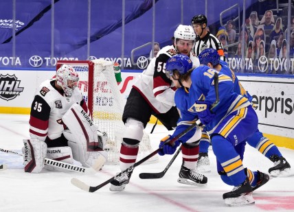 Feb 6, 2021; St. Louis, Missouri, USA;  Arizona Coyotes goaltender Darcy Kuemper (35) looks back after giving up a goal to St. Louis Blues center Robert Thomas (18) during the first period at Enterprise Center. Mandatory Credit: Jeff Curry-USA TODAY Sports