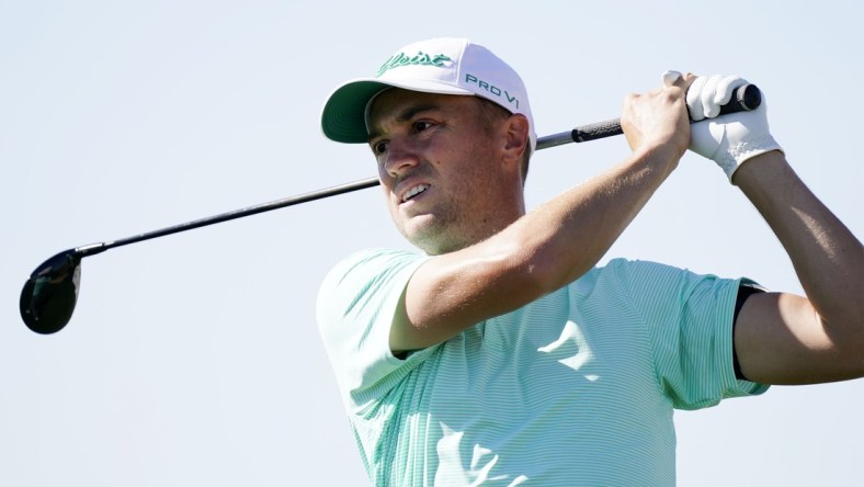 Feb 6, 2021; Scottsdale, Arizona, USA; Justin Thomas plays his tee shot on the ninth hole during round three of the Waste Management Phoenix Open at TPC Scottsdale. Mandatory Credit: Rob Schumacher-Arizona Republic via USA TODAY Network